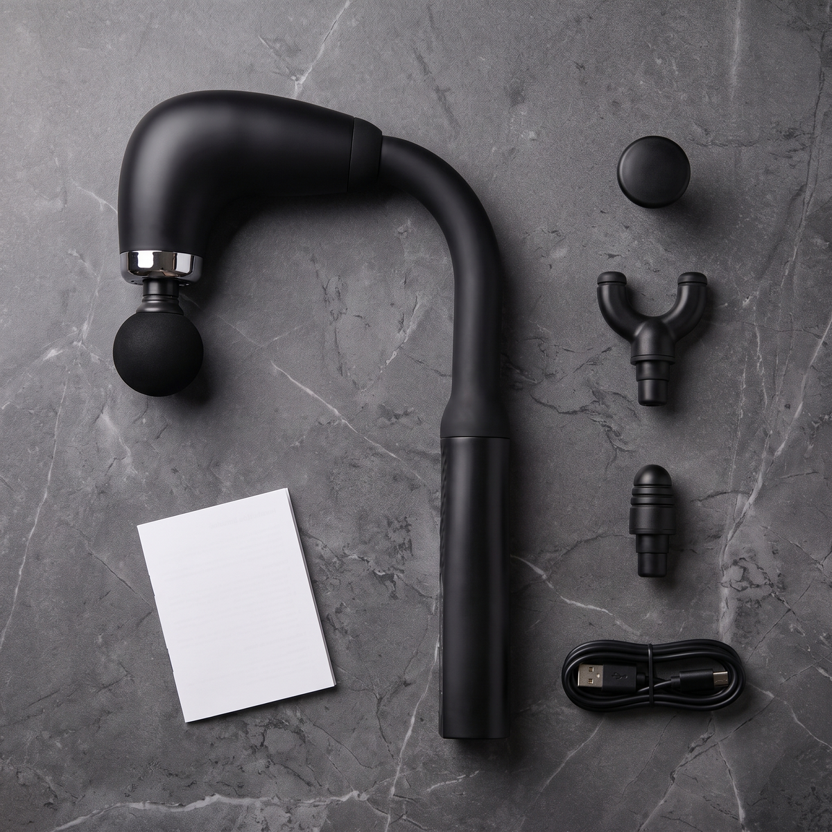 Everything in the box: ReachGun, 4 heads, USB C cable and manual